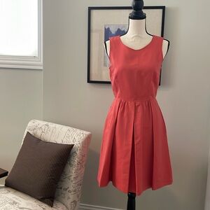 Coral pink sleeveless dress, with pockets